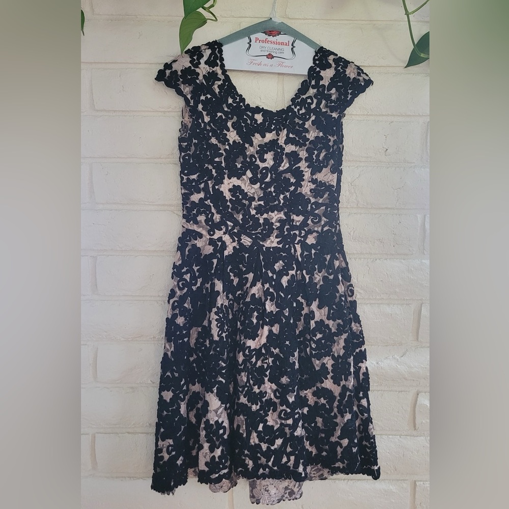 Black and beige/rose colored lace dress